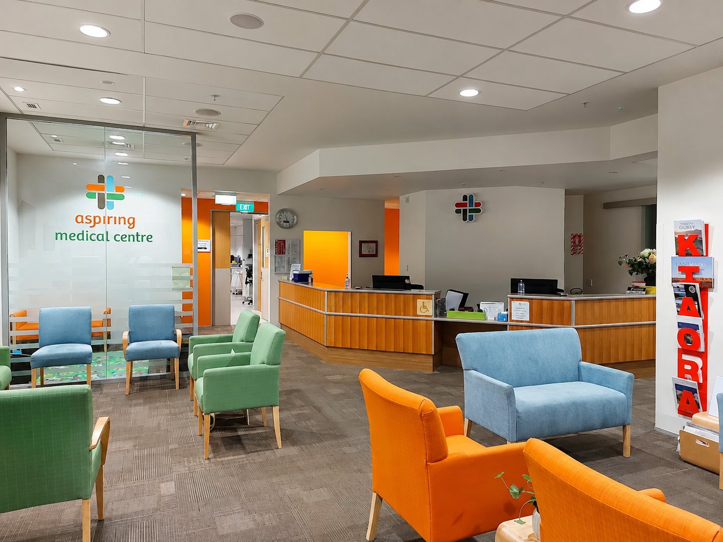 Freshly painted medical centre waiting room in orange and white